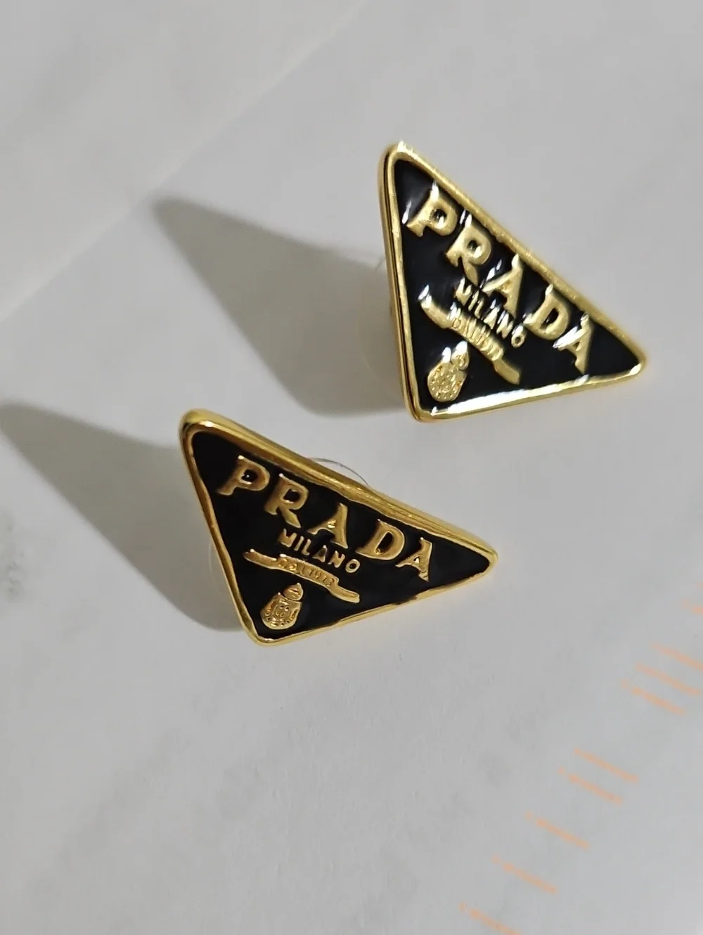 #luxury Black and Gold Triangle Logo Stud Earrings
